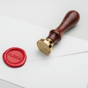 طباعة ختم شمعي مخصص بشعار فليكسون على أظرف رسمية بالرياض.